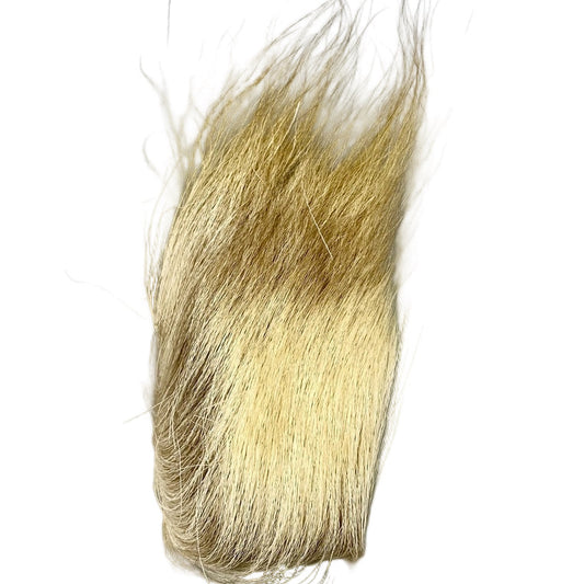 Blonde hair extension on a white background
